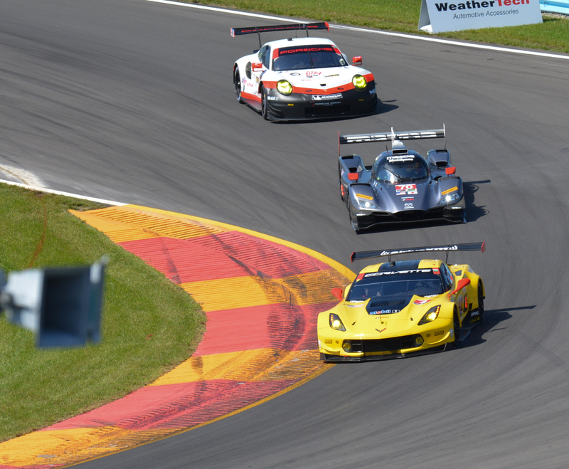 Corvette Racing Corvette C7.R leads the Mazda Motorsports Mazda DPi and Porsche GT Team 911 GT RSR through Turn 1